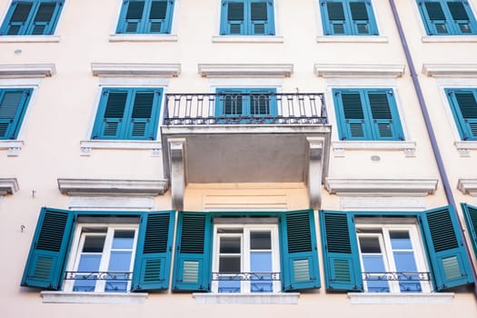 looking up at the facade of Italian building in Trieste