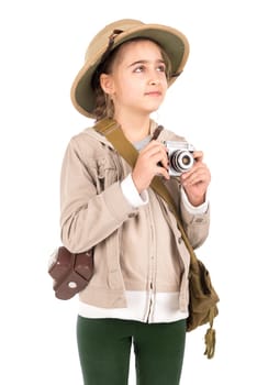 Young girl with a camera playing Safari isolated in white