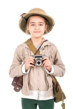 Young girl with a camera playing Safari isolated in white