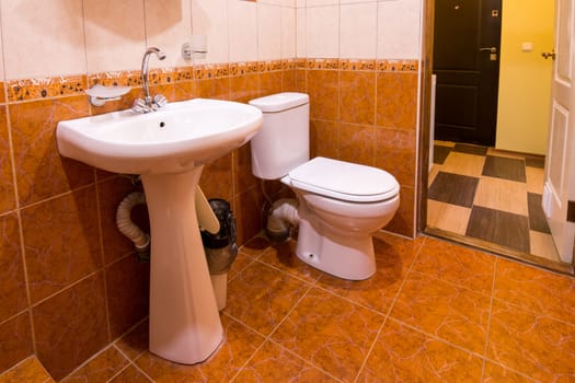 Bathroom in the hotel, washbasin and toilet