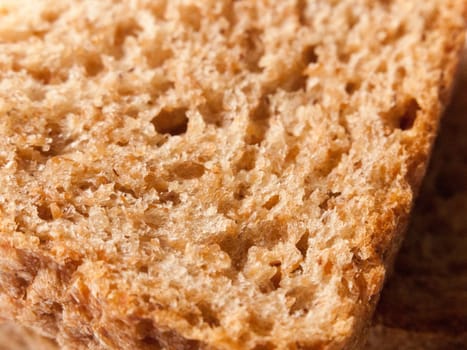 close up texture of soft brown bread studio