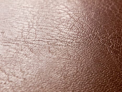 rough and smooth texture of brown leather up close studio