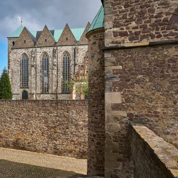 Petri Church in the old town of Magdeburg with parts of the historic city wall