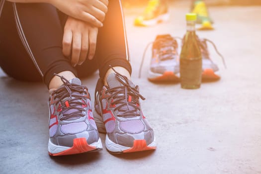 Women athletes are resting after jogging.