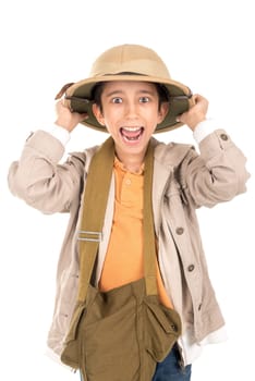 Young boy holding hat in Safari clothes isolated in white