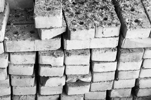 Pile of old bricks black and white theme