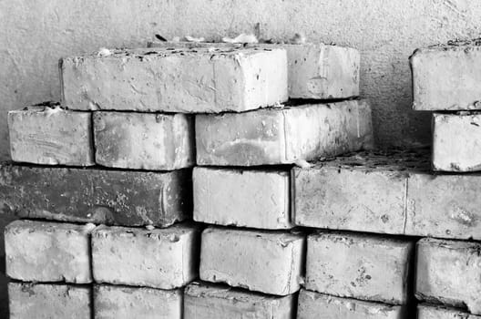 Pile of old bricks black and white theme
