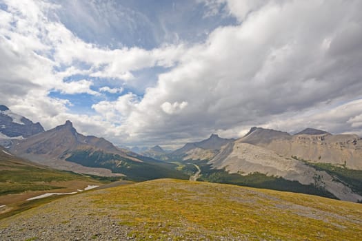 Sun and Clouds above the Alpine Tundra of the Canadian Rockies in Jasper National Park in Alberta, Canada