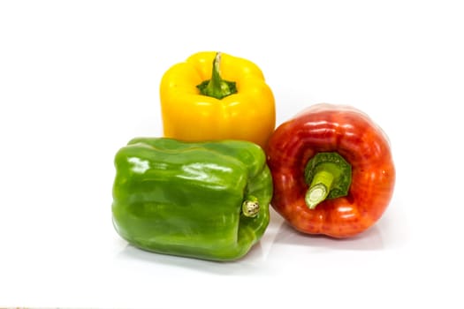 colored peppers over white background, Fresh vegetables sweet Peppers or Bell peppers