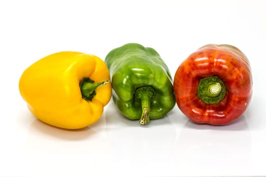 colored peppers over white background, Fresh vegetables sweet Peppers or Bell peppers