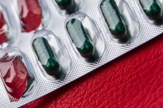 blur of pill and capsule of antibiotics in blister packaging