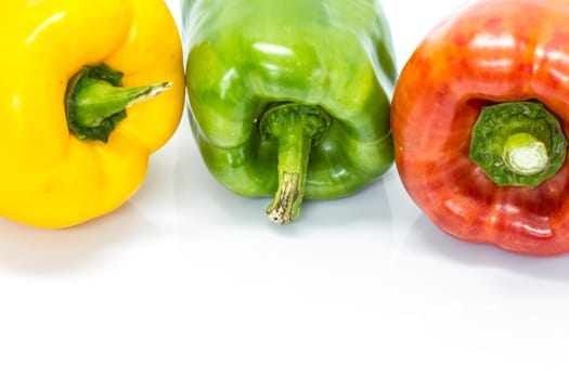 colored peppers over white background, Fresh vegetables sweet Peppers or Bell peppers