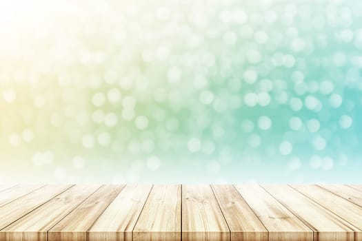 Empty wooden table top with blurred color light bokeh circle background. can be used product display.