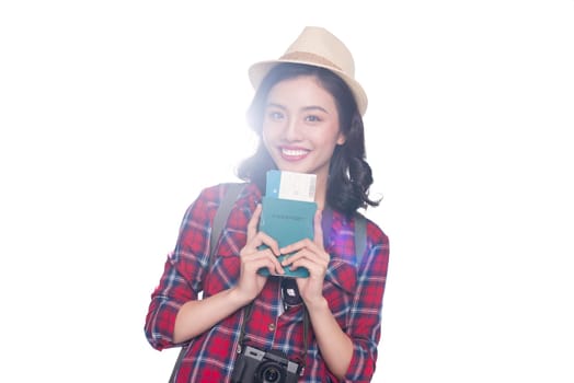 Woman travel. Young beautiful asian woman traveler holding passport and air ticket standing over white.
