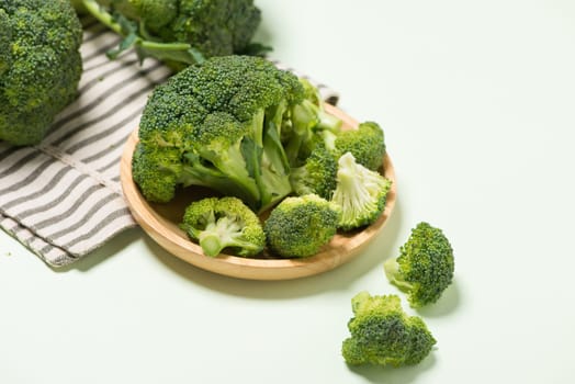 Modern style of the Broccoli isolated on green background.