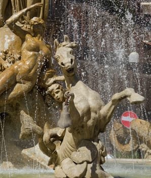 Piazza Archimede Square, Fontana d'Artemide fountain (Fontana di Diana) in Ortigia, Syracuse, Sicily, Italy (detail)
