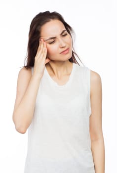 Young woman suffering of a headache, isolated on white