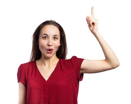 Young woman pointing up at copy space, isolated on white