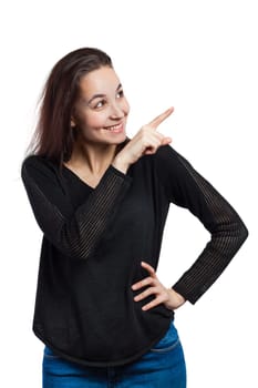 Smiling young woman pointing at copy space, isolated on white