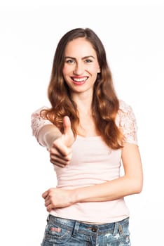 Young woman having a victory gesture, isolated on white