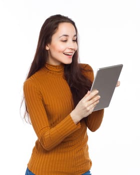 Happy beautiful woman holding an electronic tablet, isolated on white