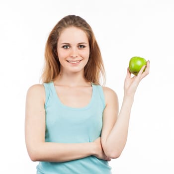 Portrait of a beautiful girl holding a green apple, isolated on white