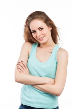 Portrait of a casual girl standing with arms crossed, isolated on white