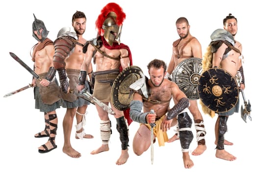 Group of gladiators posing isolated in white
