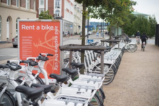 COPENHAGEN, DENMARK - JULY 31, 2016: Row of white rental Go-bikes, which can be hired per hour