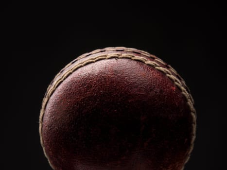 Old vintage throw ball on a dark background