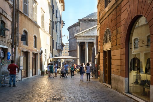 Rome, Italy - August 22, 2015: people walking in Pantheon street, the way to the Pantheon church