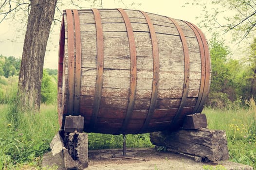 Old barrel indicating the beginning of a wine-producing area of fine grapes.