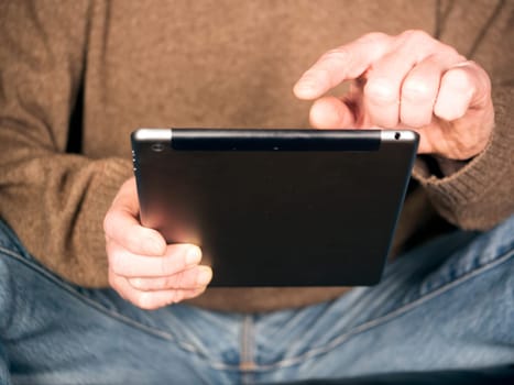 Hands Holding Tablet