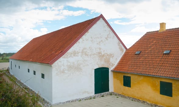 danish farmhouse with barn on the Zealand island