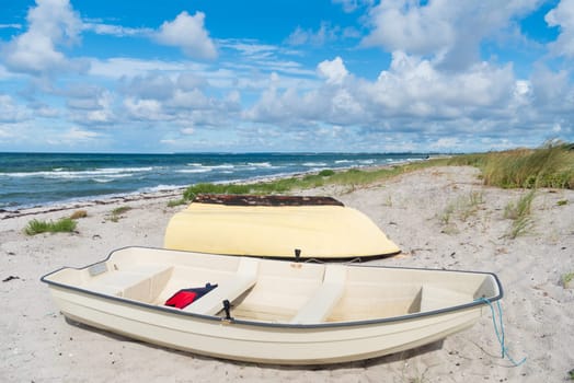 small fishing boats on a danish beach