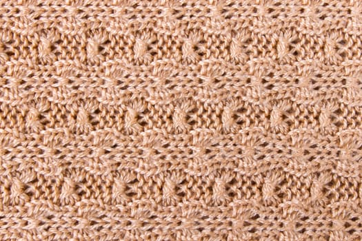 Brown knitting fabric texture background or knitted pattern background. Knitting or knitted background.