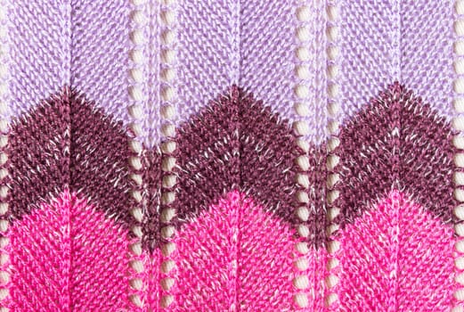 Vertical purple pink knitting fabric texture background or knitted pattern background for design. Knitting or knitted