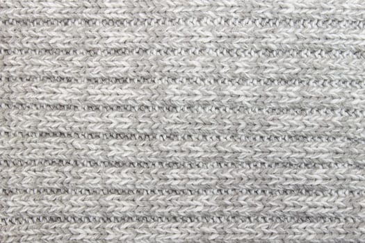 Horizontal gray knitting fabric texture background or knitted pattern background. Knitting or knitted background for design.
