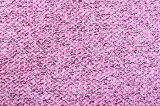 Pink knitting fabric texture background or knitted pattern background for design. Knitting or knitted