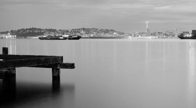 Serene Night Time Scene Pilings Barges Puget Sound in Seattle