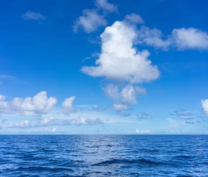 seascape with clouds and blue sky background ..