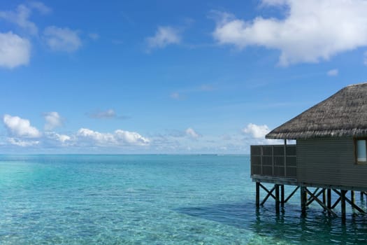 Meeru resort and spa, Maldives - May 8, 2017: Water villas over calm sea in tropical Maldives island
