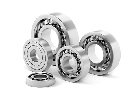 Group of ball bearings with different sizes on white background