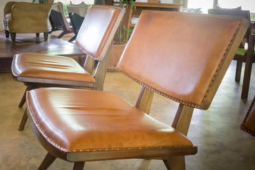 Vintage Brown Leather and Wood Chair, stock photo