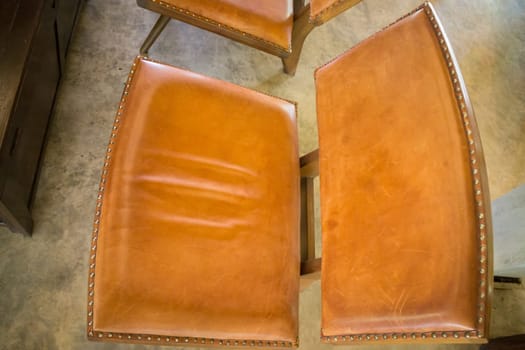 Vintage Brown Leather and Wood Chair, stock photo