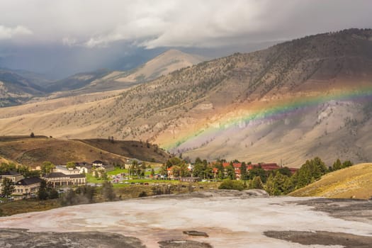 Rainbow over Mammoth Community in Yellowstone National Park, Wyoming, USA.
