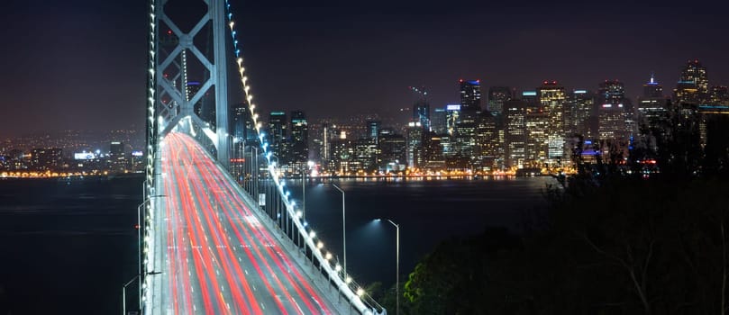 Car lights create streaks in this long exposure of the Bay Bridge