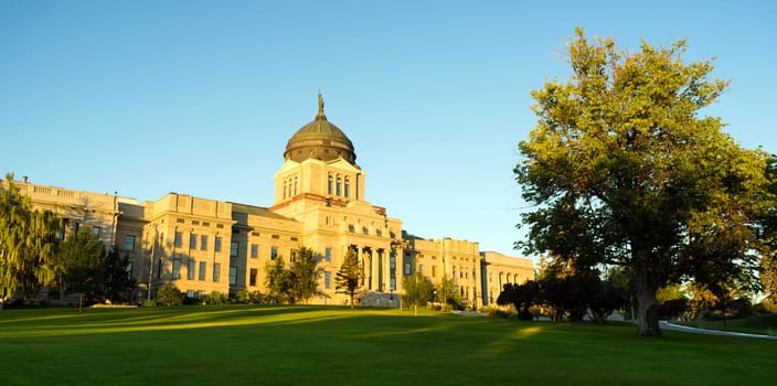 The sun hits the capital building in Helena just after sunrise