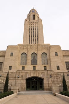 Wide brick walkways lead into Lincoln's State Capital Building