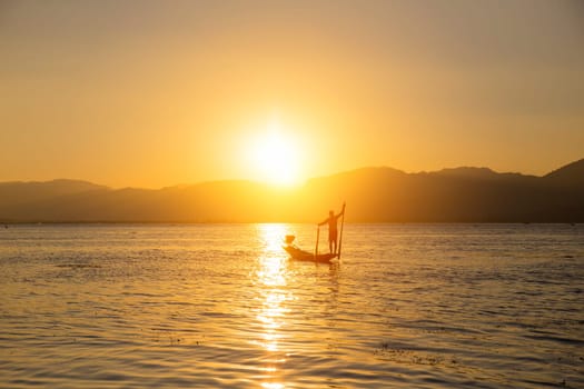 Fisherman of Lake in action when fishing, Myanmar (Burma)